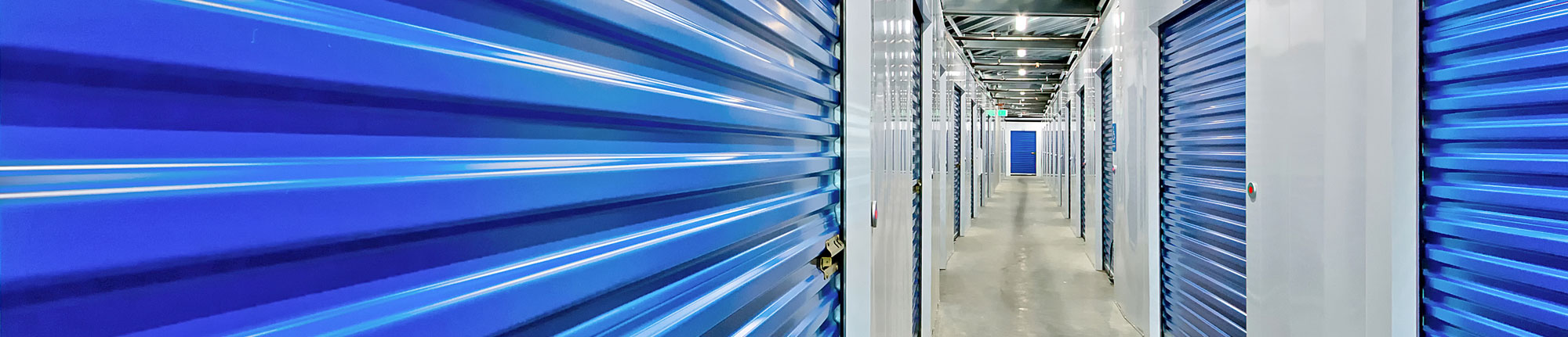 Hallway with self-storage doors and units equipped with Noke Smart Entry system